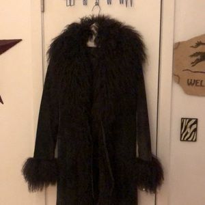 Leather and suede coat !! Beautiful brown very classy . Paid 490.00